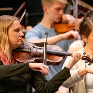 First desk violins: concertmaster Megan Jones, Deborah Tamminga